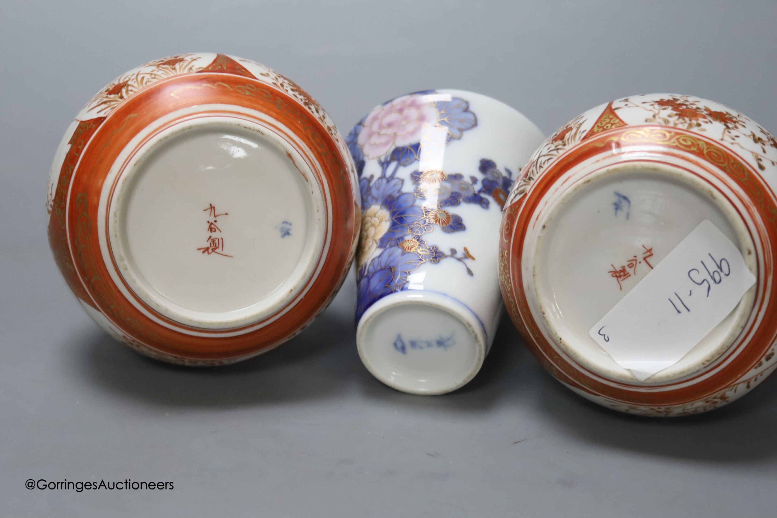 A Japanese porcelain vase, by Fukugawa and two Kutani bottle vases, height 21cm